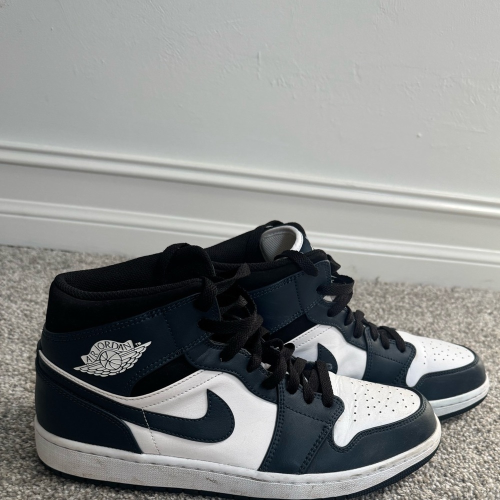 Jordon 1’s Navy and White Mid-Top Sneakers